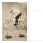 Trick Cyclist Balancing on Candles by Anonymous
