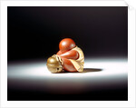 Netsuke abstract doll leaning over a bell by Unknown