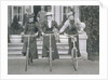 Three Women on Bikes by Unknown