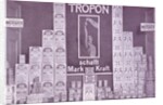 Photograph of a shop window with a display of Tropon goods by Anonymous