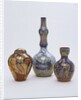 Bottle and vases by William De Morgan