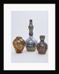 Bottle and vases by William De Morgan