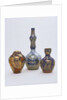Bottle and vases by William De Morgan