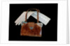 Handbag and glove by Unknown