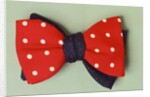 Two contrasting bow ties with poker dot pattern by Turnbull and Asser Ltd.