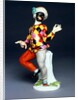 Harlequin holding a black cherry by Johann Joachim Kändler