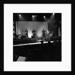Johnny Hallyday with band performing on the Palladium Stage by Harry Hammond