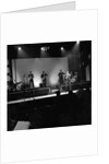 Johnny Hallyday with band performing on the Palladium Stage by Harry Hammond