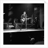 Johnny Hallyday with band performing on the Palladium Stage by Harry Hammond