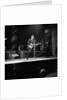 Johnny Hallyday with band performing on the Palladium Stage by Harry Hammond