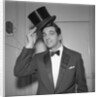Frankie Vaughan posing with a hat by Harry Hammond