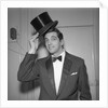 Frankie Vaughan posing with a hat by Harry Hammond