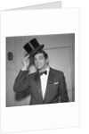 Frankie Vaughan posing with a hat by Harry Hammond