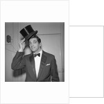 Frankie Vaughan posing with a hat by Harry Hammond