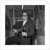 Peter Sellers holding a guitar by Harry Hammond