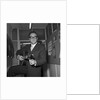 Peter Sellers holding a guitar by Harry Hammond