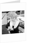 Marion Ryan, 1950s British pop singer, seated by a piano by Harry Hammond