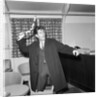 Cliff Richard playing with a boomerang by Harry Hammond