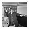 Cliff Richard playing with a boomerang by Harry Hammond