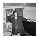 Cliff Richard playing with a boomerang by Harry Hammond