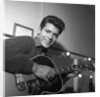 Cliff Richard with guitar by Harry Hammond