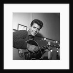 Cliff Richard with guitar by Harry Hammond