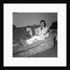 Cliff Richard on a sofa with soft toys by Harry Hammond