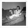 Cliff Richard on a sofa with soft toys by Harry Hammond