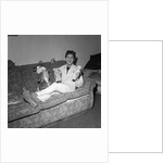 Cliff Richard on a sofa with soft toys by Harry Hammond