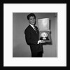 Cliff Richard with his first gold record by Harry Hammond