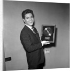Cliff Richard with his first gold record by Harry Hammond