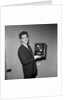 Cliff Richard with his first gold record by Harry Hammond