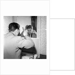 Cliff Richard combing his hair by Harry Hammond