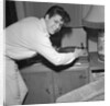 Cliff Richard playing records by Harry Hammond