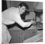 Cliff Richard playing records by Harry Hammond