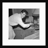 Cliff Richard playing records by Harry Hammond