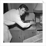 Cliff Richard playing records by Harry Hammond