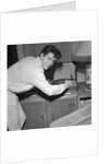 Cliff Richard playing records by Harry Hammond