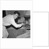 Cliff Richard playing records by Harry Hammond
