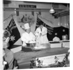 Cliff Richard baking at J.Lyons in Cadby Hall, Hammersmith by Harry Hammond