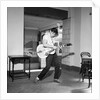Cliff Richard playing the guitar by Harry Hammond