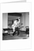 Cliff Richard playing the guitar by Harry Hammond