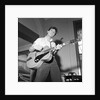 Cliff Richard playing the guitar by Harry Hammond