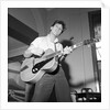 Cliff Richard playing the guitar by Harry Hammond