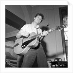 Cliff Richard playing the guitar by Harry Hammond