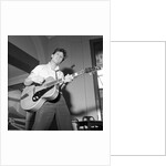 Cliff Richard playing the guitar by Harry Hammond