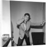Cliff Richard rehearsing in a dressing room by Harry Hammond