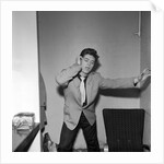 Cliff Richard rehearsing in a dressing room by Harry Hammond