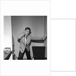 Cliff Richard rehearsing in a dressing room by Harry Hammond