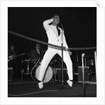 Cliff Richard performing on stage by Harry Hammond